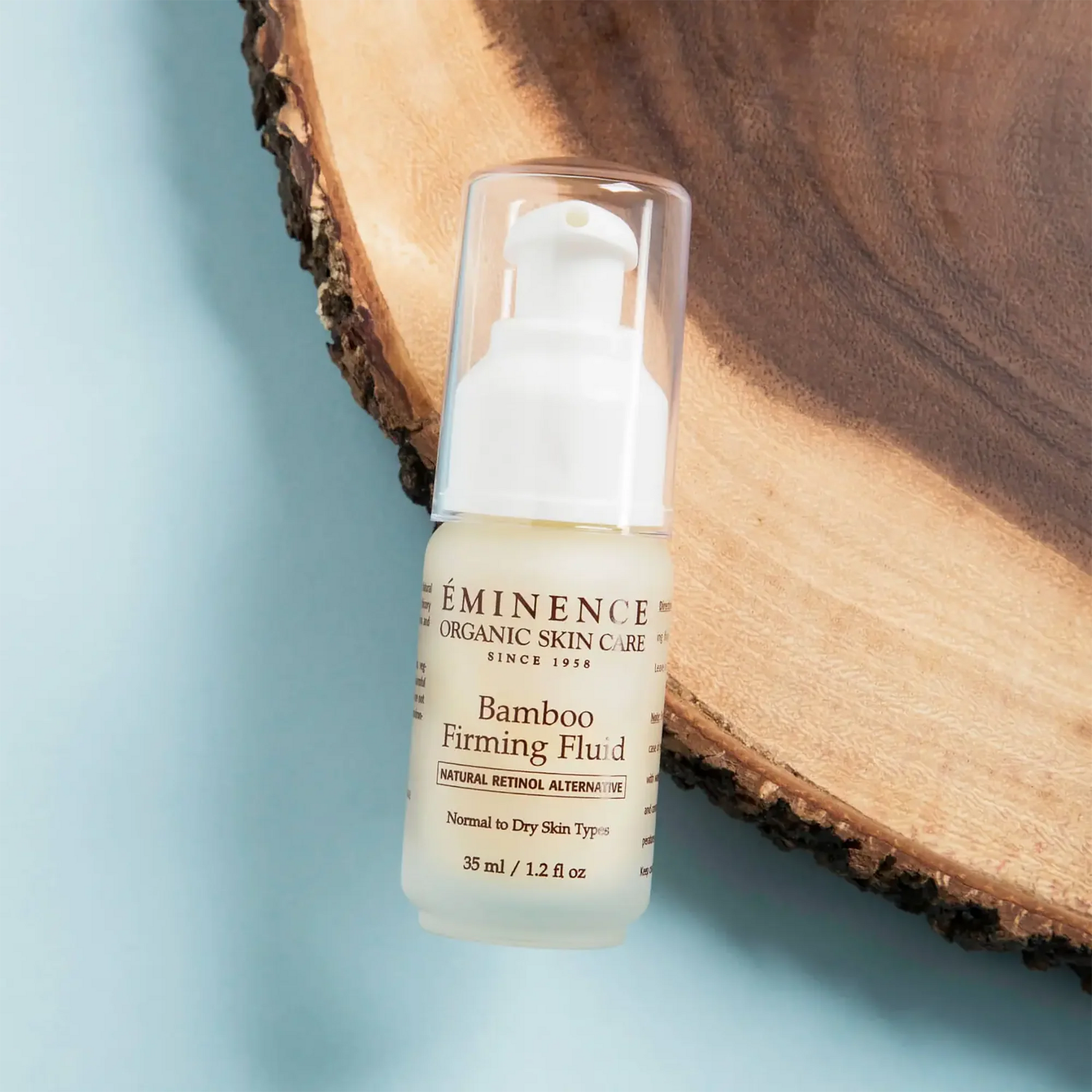 Eminence Bamboo Firming Fluid flatlay