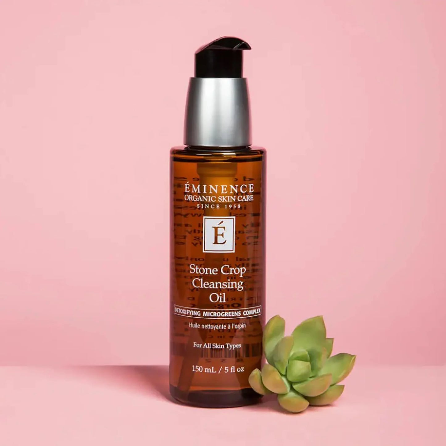 Eminence Stone Crop Cleansing Oil pink backdrop