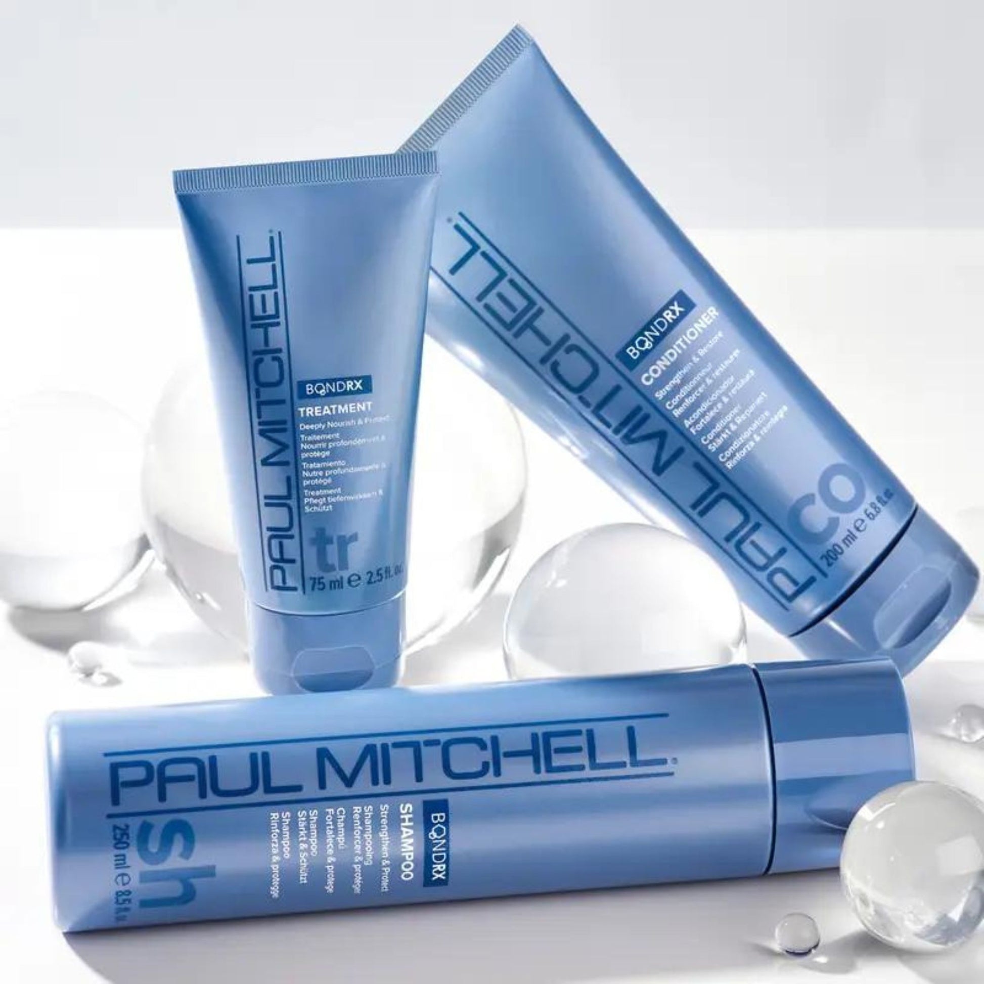 Bond Rx Shampoo - Salon Blissful - Paul Mitchell - product bottles displayed together with white background