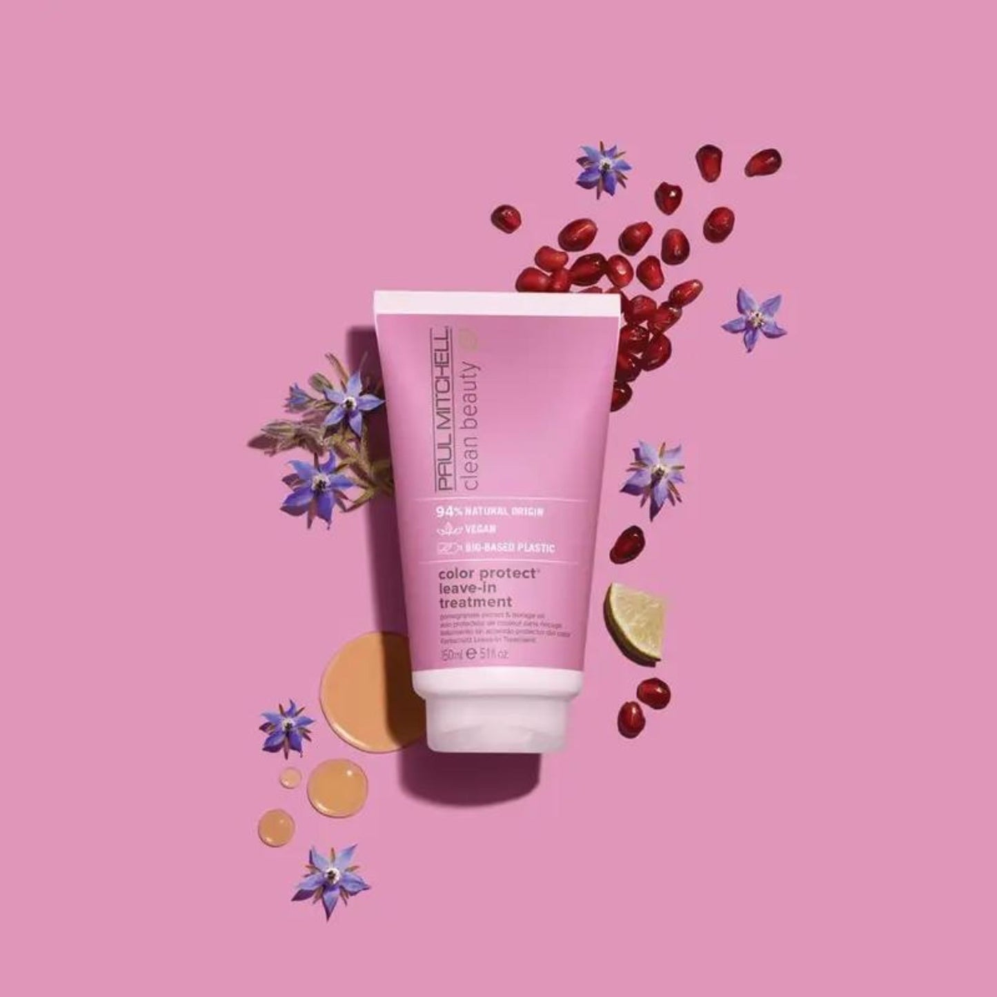 Clean Beauty Color Protect Leave-In Treatment - Salon Blissful - Paul Mitchell - product flat lay with flowers and fruit on purple background. 