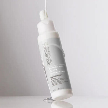 Clean Beauty Scalp Therapy Drops - Salon Blissful - Paul Mitchell - Serum bottle with serum dripping to show texture