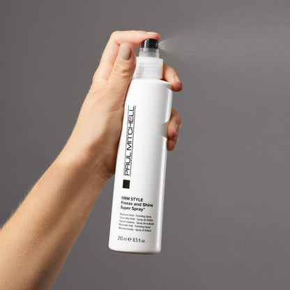 Freeze and Shine Super Spray - Salon Blissful - Paul Mitchell -model spraying mist