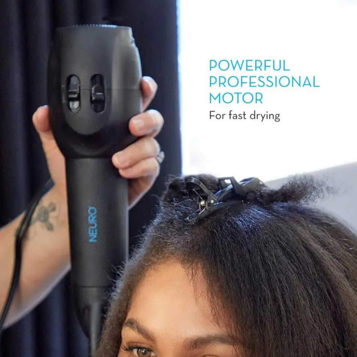 Salon Blissful - Paul Mitchell -Neuro Grip Hair Dryer-model holding dryer near hair