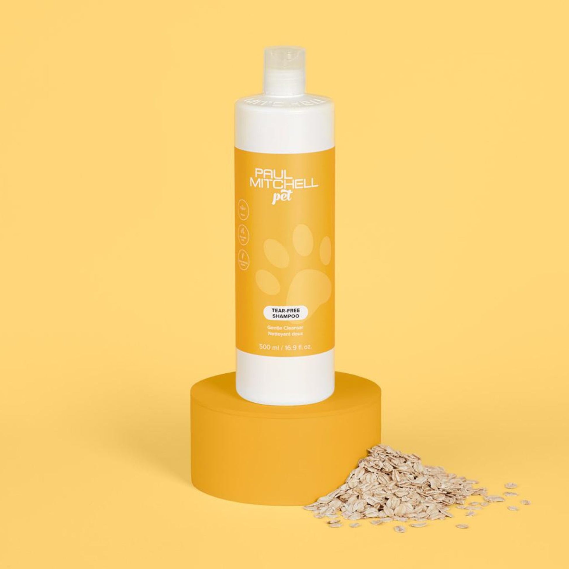 Tear-Free Shampoo (Pet) - Salon Blissful - Paul Mitchell - 16.9 oz product displayed on yellow stand with yellow background